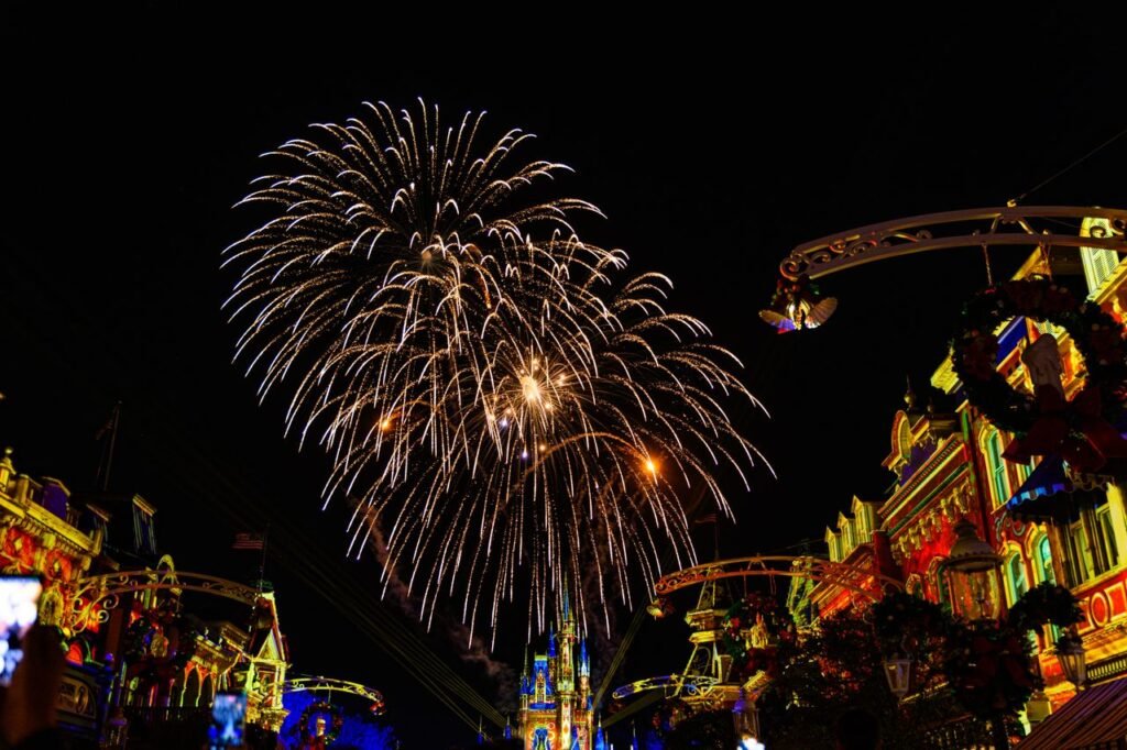 Bright fireworks over Main Street at night in Orlando, capturing a magical evening in Florida.